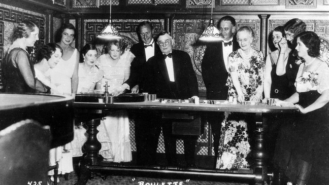 Divorcees surround the roulette table at the Bank Club during the 1930's, before legalized gambling. Courtesy: Nevada Historical Society