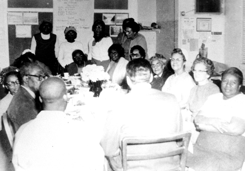 Image from a mid-to-late 1950s NAACP meeting where hotel desegregation was being discussed.