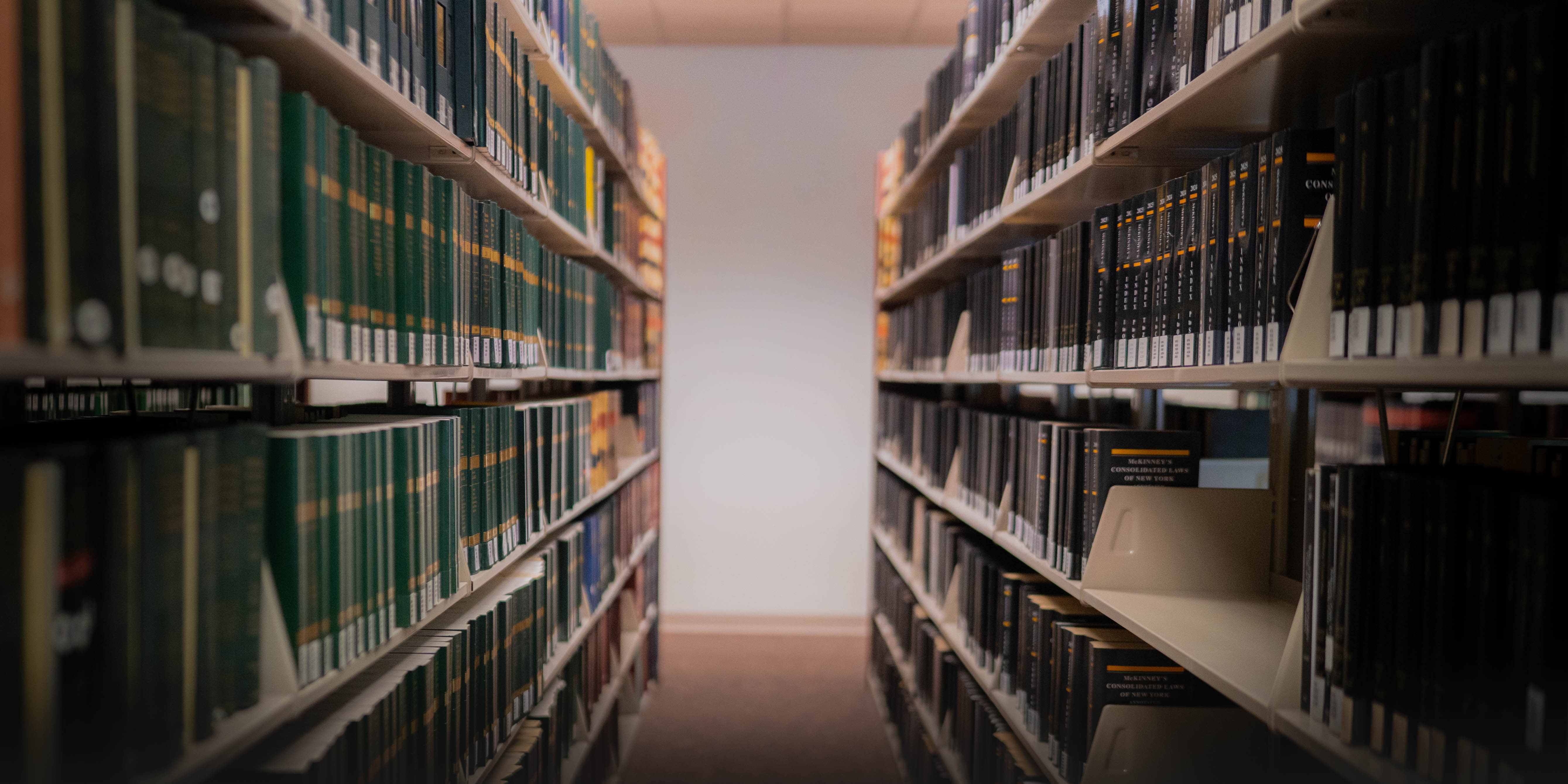 This image features neatly pack law books filling up shelves