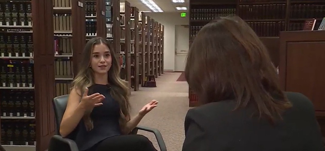 Woman being interviewed in the Supreme Court of Nevada Law Library